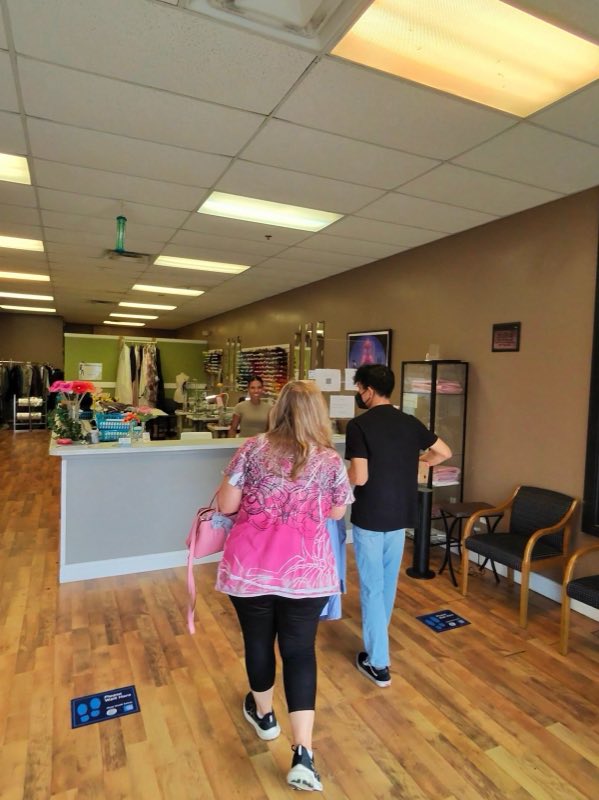 Front counter and fitting area with staff and customers